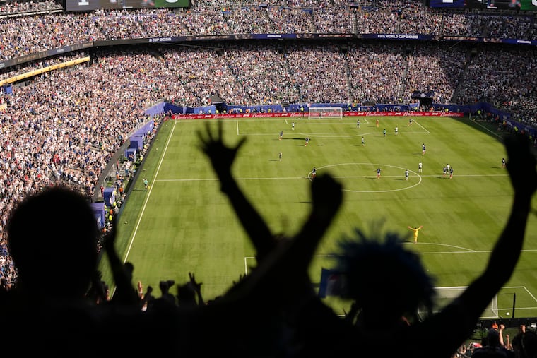 Fans react during France's opening match against Senegal on June 16. Some of those fans have taken up residence in Philadelphia ahead of Monday's match against Iraq.