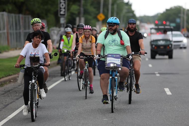 Cyclists take part in an August memorial ride in honor of Mario D'Adamo III, who was struck and killed by a motorist while riding his bike in an unprotected bike lane in FDR Park.