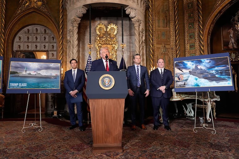President Donald Trump speaks, with from left, Secretary of State Marco Rubio, Defense Secretary Pete Hegseth and Secretary of the Navy John Phelan,at his Mar-a-Lago club, Monday, Dec. 22, 2025, in Palm Beach, Fla.
