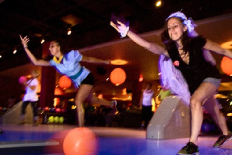 A bachelorette party at Lucky Strike Lanes, on the second and third floors of the old Woolworth building on Chestnut Street.