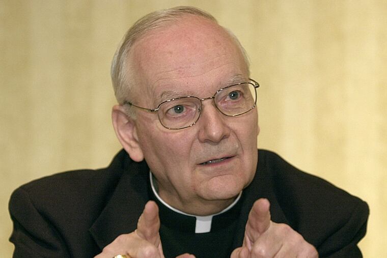 Former Erie Bishop Donald Trautman, shown in a 2003 photo, is sharply criticized in a new grand jury report.