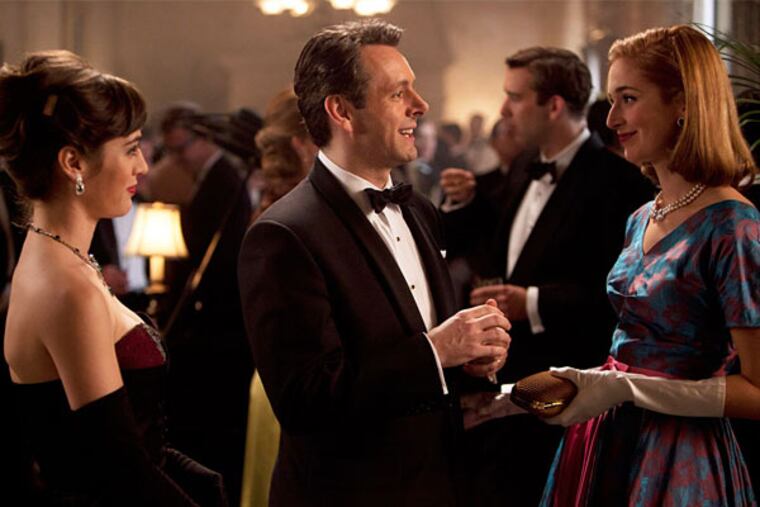 Lizzy Caplan (left) as Virginia Johnson, and Michael Sheen and Caitlin Fitzgerald as William and Libby Masters.