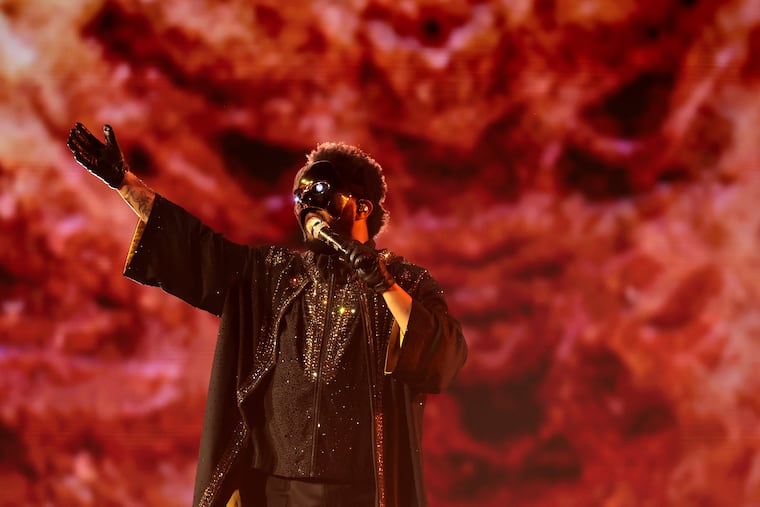 The Weeknd performs during "his After Hours Til Dawn" stop at Lincoln Financial Field on Wednesday.