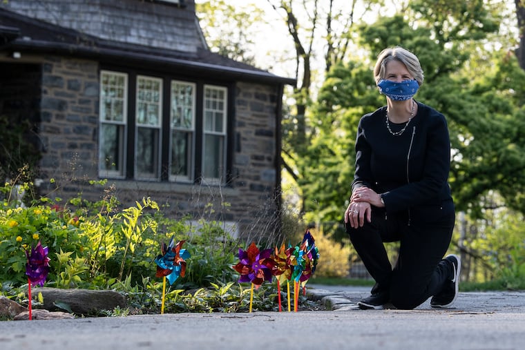 Wendy Raymond, Haverford College president, celebrates virtual Pinwheel Day at Haverford College. Every year, students fill the college green with colorful pinwheels on a surprise day in April. This year, the event was held virtually because of the coronavirus.