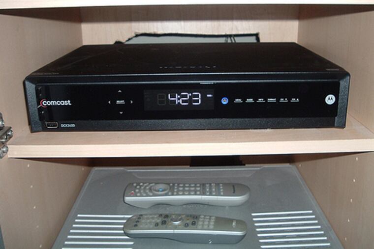 After a year of negotiating, Comcast Corp., DirecTV and other TV operators agreed last week to energy-efficiency standards for set-top boxes, which can suck more electricity off the grid than wide-screen TVs.