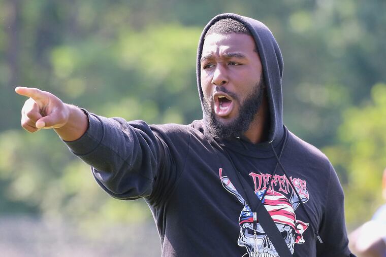 New Washington Township High School football coach Lamont Robinson