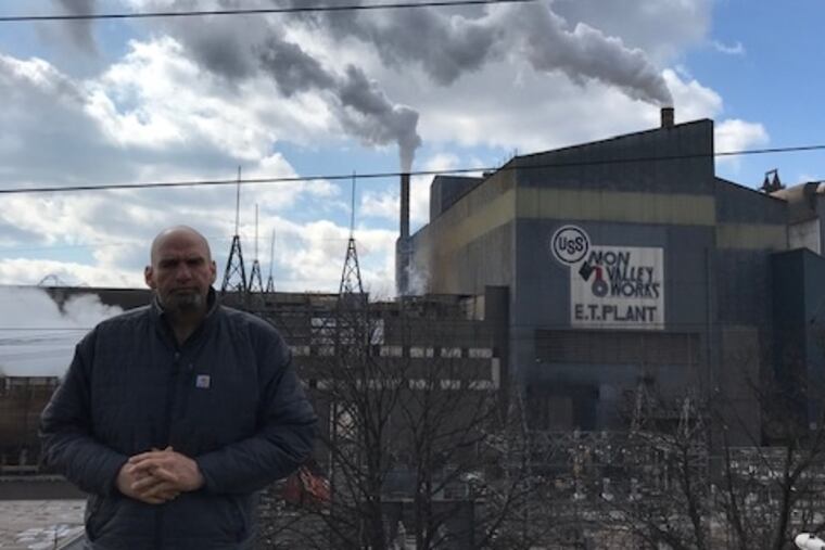 Lt. Gov. John Fetterman pictured outside his house across the street from U.S. Steel's Edgar Thomson Works facility in Braddock, Pa., on Feb. 28.
