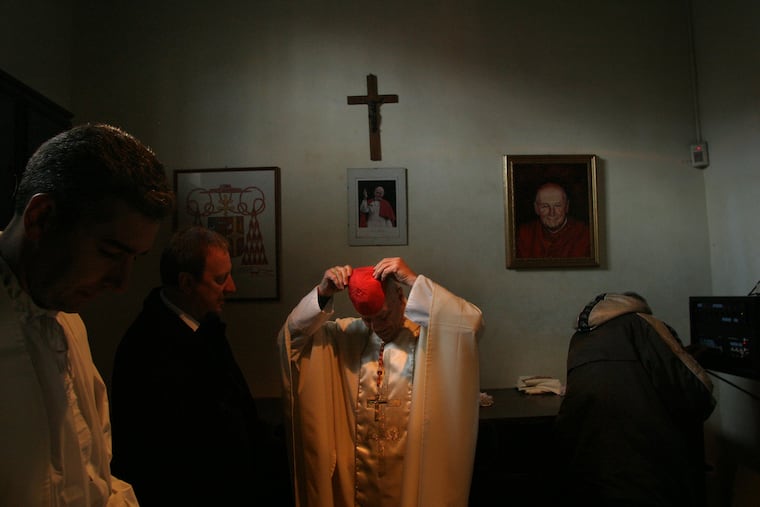 Cardinal Theodore McCarrick, now defrocked, prepares to celebrate Mass at the Basilica of Sts. Nereus and Achilleus in Rome in 2005.