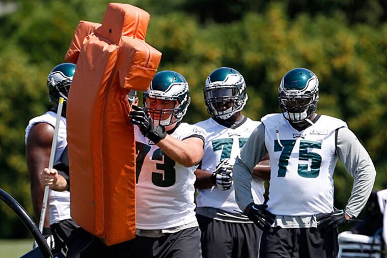 Eagles' Brian Mihalik picks-up the tackling dummy.