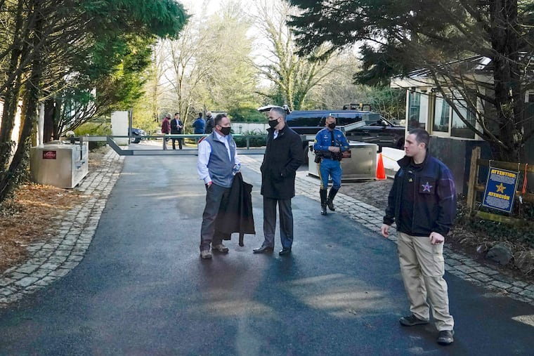 Security personnel stand at the entrance to President Joe Biden and first lady Jill Biden's home in Wilmington, Del., on Feb. 21, 2021. Biden acknowledged on Thursday that a document with classified markings from his time as vice president was found in his “personal library” at his home in Wilmington, Delaware, along with other documents found in his garage, days after it was disclosed that sensitive documents were also found at the office of his former institute in Washington.