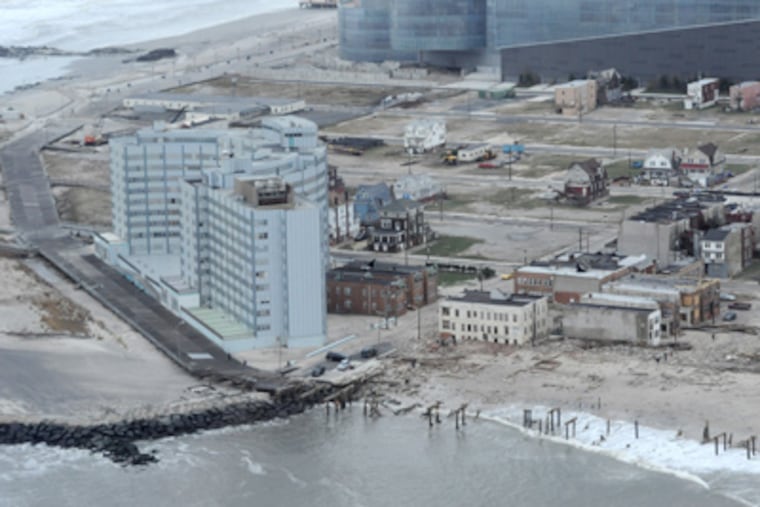 The northern tip of Atlantic City on Tuesday, Oct. 30, 2012 shows where the boardwalk was destroyed after Hurricane Sandy blew across the area. Revel casino is in the top portion of the photo. (Clem Murray / Staff Photographer)