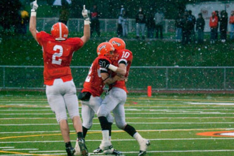Cherokee's Tyler Powell (2) celebrates a 14-0 win over Egg Harbor at end of the 4th quarter on December 5. (Akira Suwa / Staff Photographer )