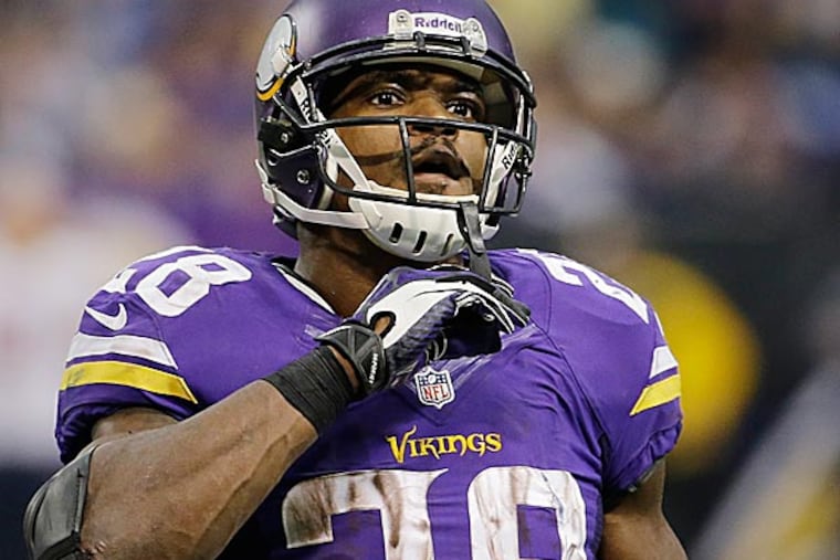 Vikings running back Adrian Peterson. (Ann Heisenfelt/AP)