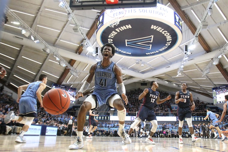 Saddiq Bey, center of Villanova celebrates after a 1st half dunk against Penn on Dec. 4, 2019 at the Finneran Pavilion at Villanova University.