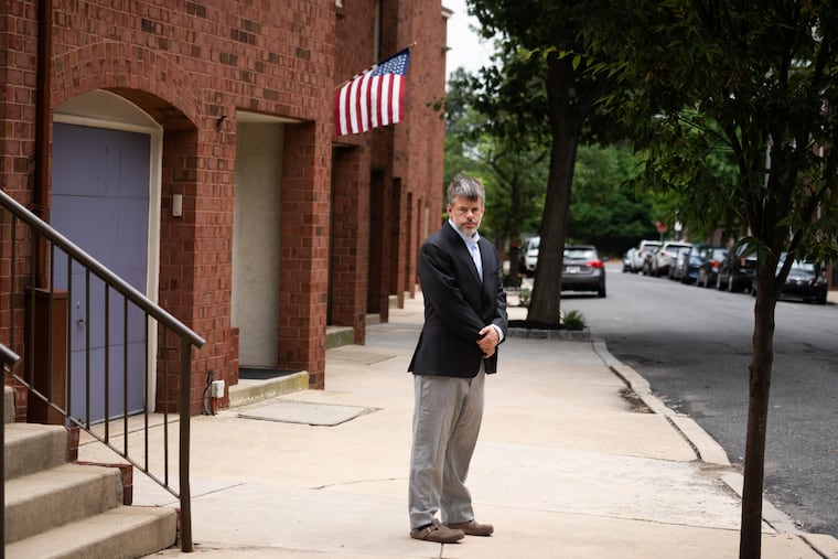 Brent Rose stands at the bus stop where his nine-year-old son, who has autism, waits for the bus to travel to Philadelphia's Extended School Year program for kids with special needs, in Philadelphia, July 10, 2026. The problem is that his bus often never shows up to take him there.