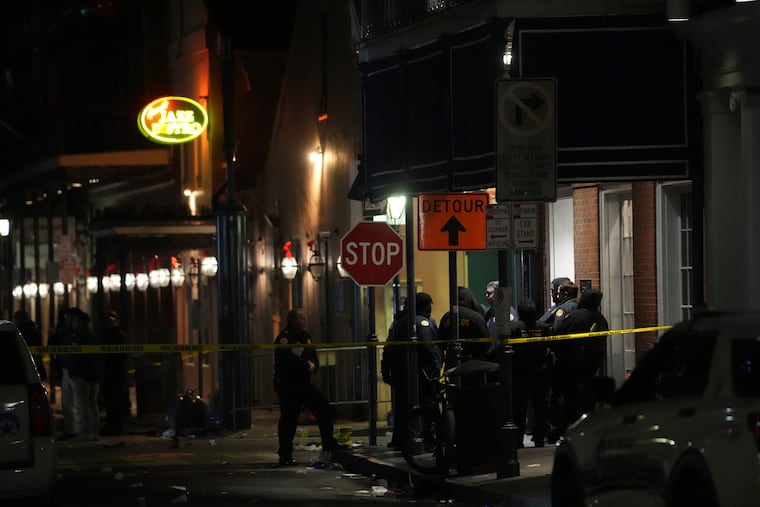Emergency services attend the scene after a vehicle drove into a crowd on New Orleans' Canal and Bourbon Street on Wednesday.
