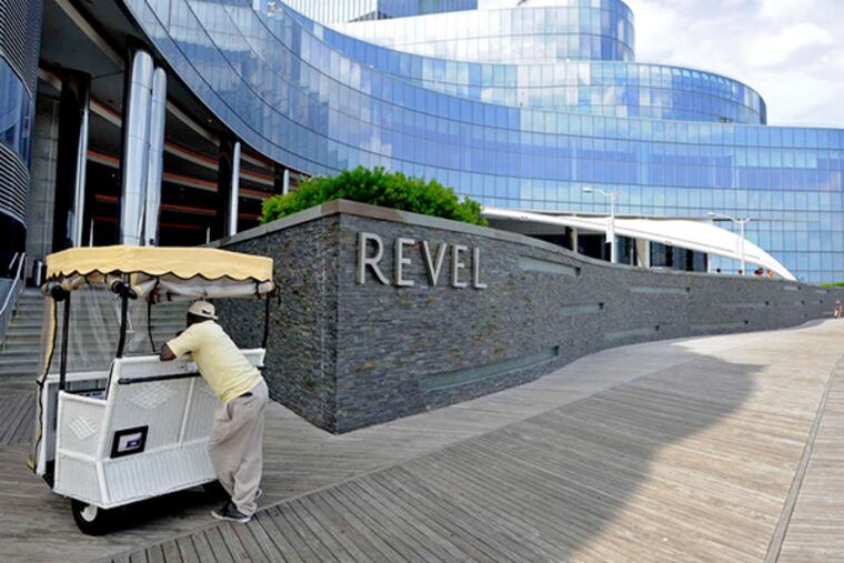 Rolling Chair operator Jean Desir waiting for fares near the Revel in Atlantic City on Thursday.