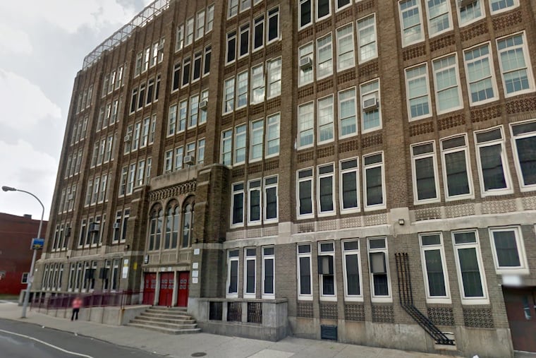 Richard Migliore claims the former principal of Mastbaum Vocational/Technical High School (pictured) and senior district officials retaliated against him after his book, "Whose School is It? The Democratic Imperative for Our Schools," was published in 2007.