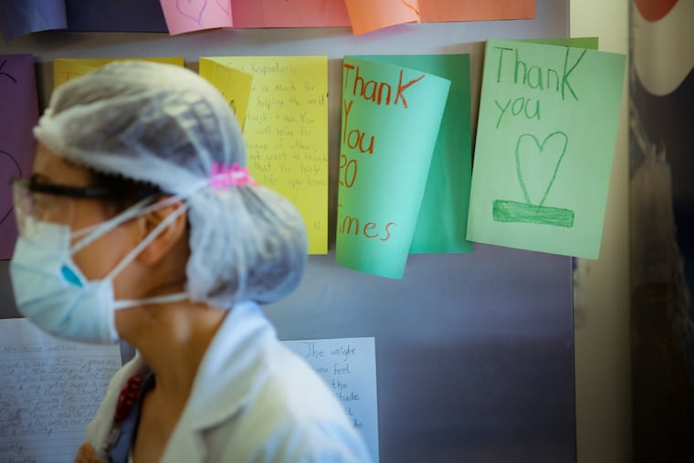 In this May 29 photo, letters of thanks from students adorn the walls of a break room that was set up for workers to decompress from the stresses of caring for COVID-19 patients at Elmhurst Hospital, in New York.