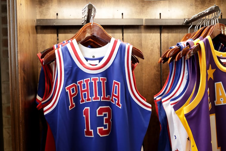 A Mitchell & Ness vintage-looking Sixers jersey on display at the company's Center City store.