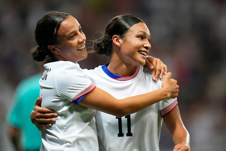 Mallory Swanson (left) and Sophia Wilson together in a game at the 2024 Olympics. They haven't shared a field with Trinity Rodman since then.