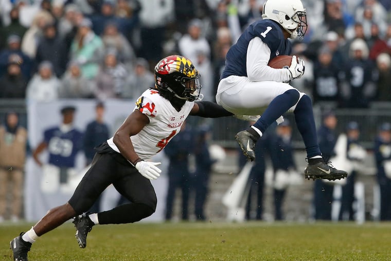 Maryland's Darnell Savage Jr. tries to defend against Penn State's KJ Hamler during a November game in State College.
