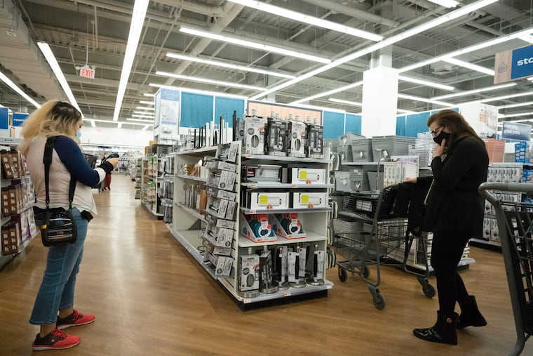 In this March 25, 2021 file photo, shoppers look at items in Bed, Bath and Beyond, in New York. Investors appeared to embrace the company's latest moves, described by executives as part of a business transformation. (AP Photo/Mark Lennihan, File)