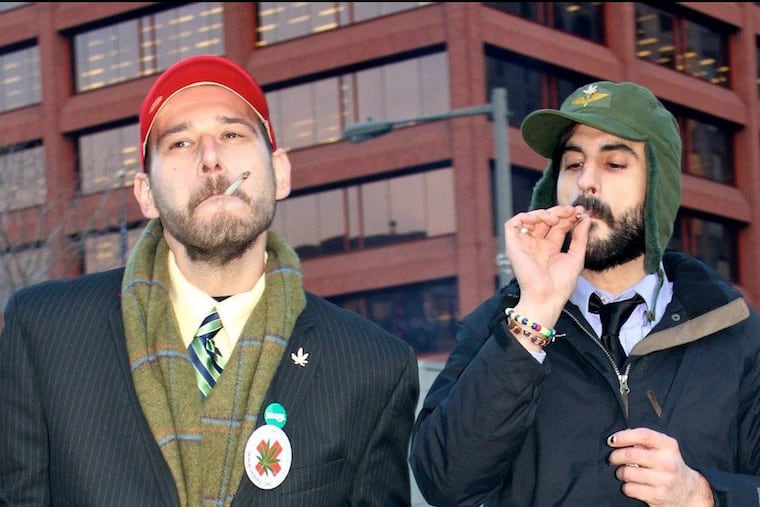Chris Goldstein (left) and N.A. Poe at a marijuana legalization rally in October 2013.