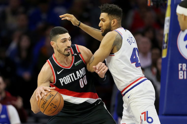 The Sixers' Jonah Bolden (43) defending the Trail Blazers' Enes Kanter on Feb. 23.