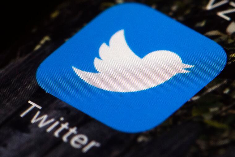 A Twitter app icon on a mobile phone is displayed. Elon Musk plans to change the logo of Twitter to an “X” from the bird, marking what would be the latest big change since he bought the social media platform for $44 billion last year.