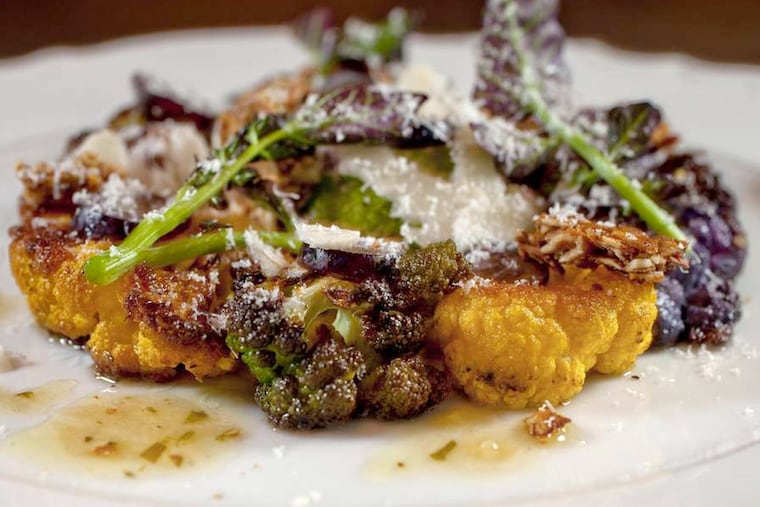Roasted cauliflower salad with pumpkin seed brittle, grapes, sheep's milk cheese, and sherry vinaigrette as served at Bank & Bourbon.