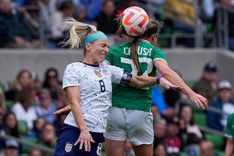 United States midfielder Julie Ertz (8) heads the ball past Ireland forward Kyra Carusa (22)on Saturday, April 8, 2023.