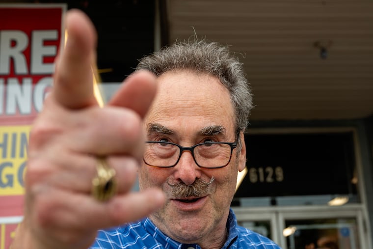 Owner Bruce Zeiger outside of his store, Smiles Linens, the longest-operating business on Woodland Avenue in Southwest Philly.