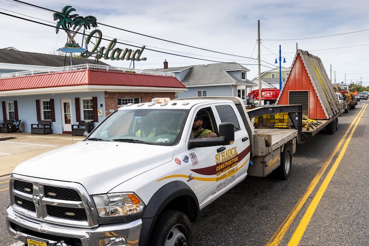 The top of a Wildwood, NJ, A-frame home makes it way along Park Boulevard on Tuesday, June 7, 2022. The movers are SJ Hauck, House Movers lifted this tiny A-Frame house for moving to another location from intersection of Park Blvd and Bennett Avenue.