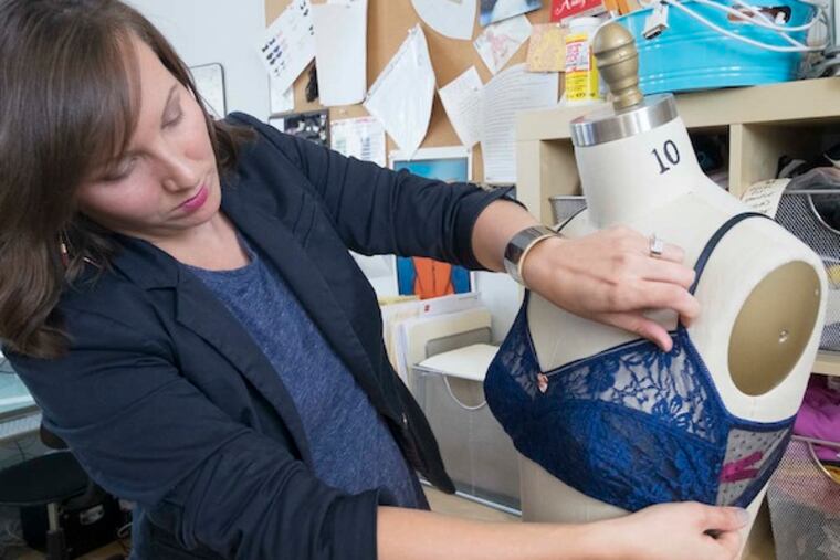 Dana Donofree, who had a double mastectomy after her cancer diagnosis 11 years ago, is shown in her studio. Sales so far are by word of mouth, but a national competition could give her a big boost: The winner gets to place a 30-second ad on February's Super Bowl telecast. ( ED HILLE / Staff Photographer )