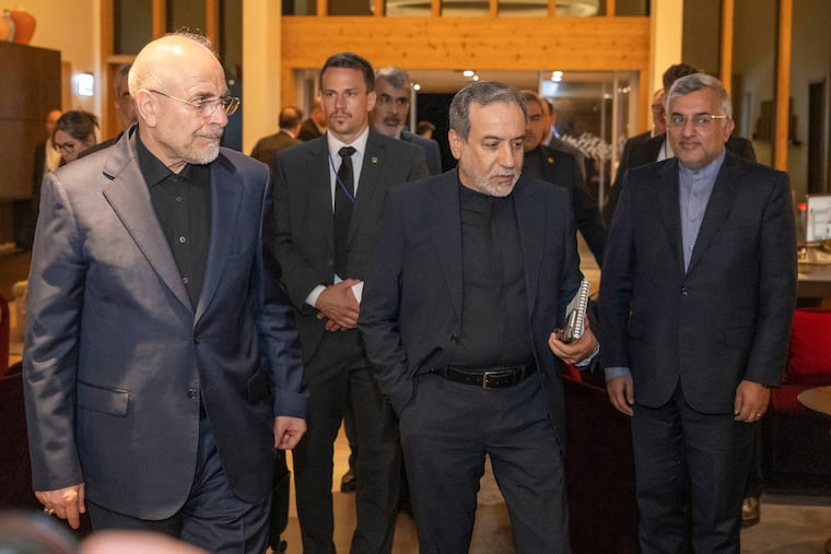 Iranian Foreign Minister Seyyed Abbas Araghchi (center) and Speaker of the Islamic Parliament of Iran Mohammed Bagher Ghalibaf (left) arrive at the Buergenstock resort in Obbuergen, near Lucerne, Switzerland, Sunday, June 21, 2026. U.S. officials feared the two men could be targets of Israeli assassination attempts.