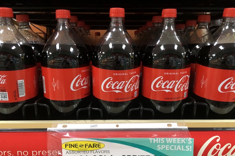 Bottles of Coca-Cola.