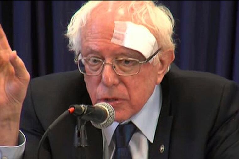 This image from video provided by WCIV-TV shows Democratic presidential candidate Bernie Sanders speaking at a health-care roundtable at the at the International Longshoremen's Association Hall on Friday, March 15 , 2019, in Charleston, S.C. Sanders was wearing a large gauze bandage on his forehead after cutting his head on a glass shower door earlier in the morning. (WCIV via AP)