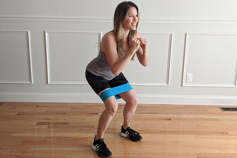 Resistance band squat