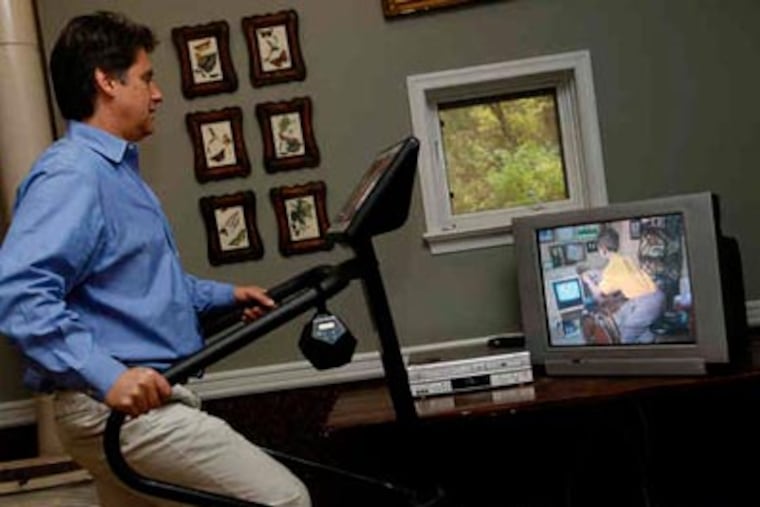 Joe Volpe demonstrations his invention, the Entertrainer. (Michael S. Wirtz / Staff Photographer)