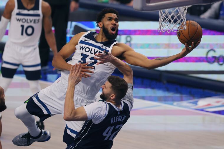The Timberwolves agreed to trade Karl-Anthony Towns (left) to the Knicks.