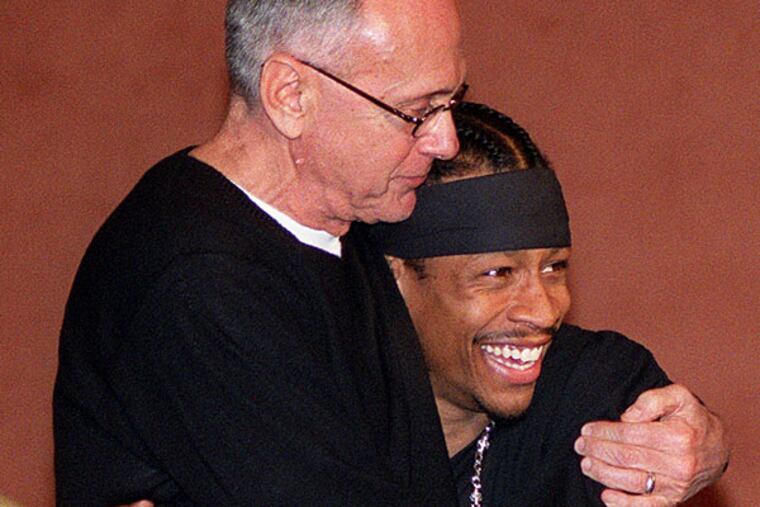 Sixers guard Allen Iverson hugging his coach Larry Brown. (G.W. Miller III/Staff file photo)
