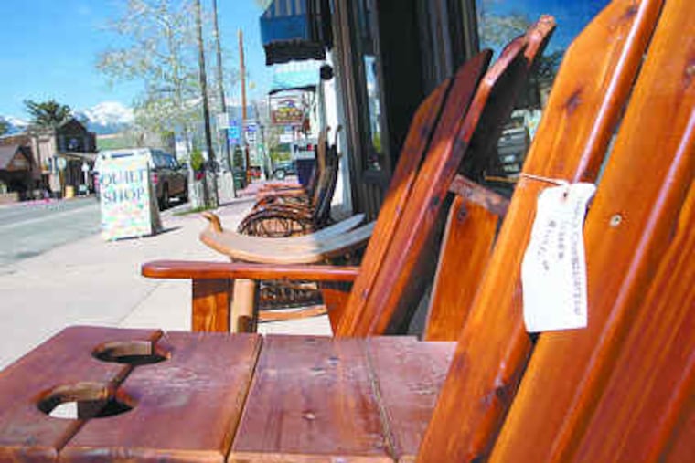 Handcrafted chairs are for sale outside Yoder's Mountain View Furniture on Main Streetin Westcliffe, Colo. Townsfolk say they are happy to have new Amish neighbors.