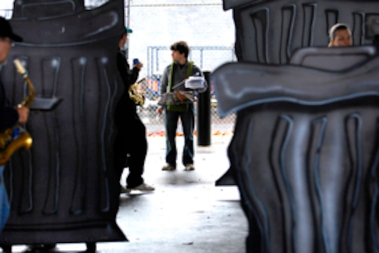 Glimpsed through Pennsport String's props is Justin Hirsch.