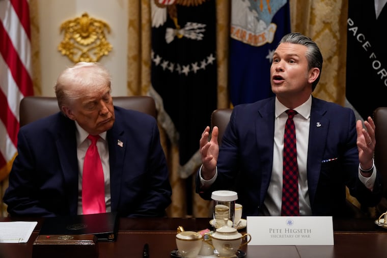 Defense Secretary Pete Hegseth speaks during a Cabinet meeting at the White House on Tuesday, Dec. 2, alongside President Donald Trump.