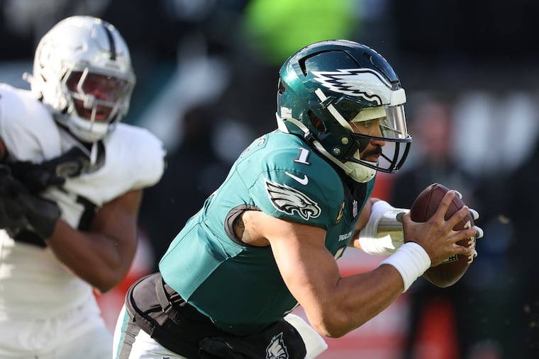 Jalen Hurts looked better at quarterback than he did wearing a Yankees hat upon his entrance at the Linc.