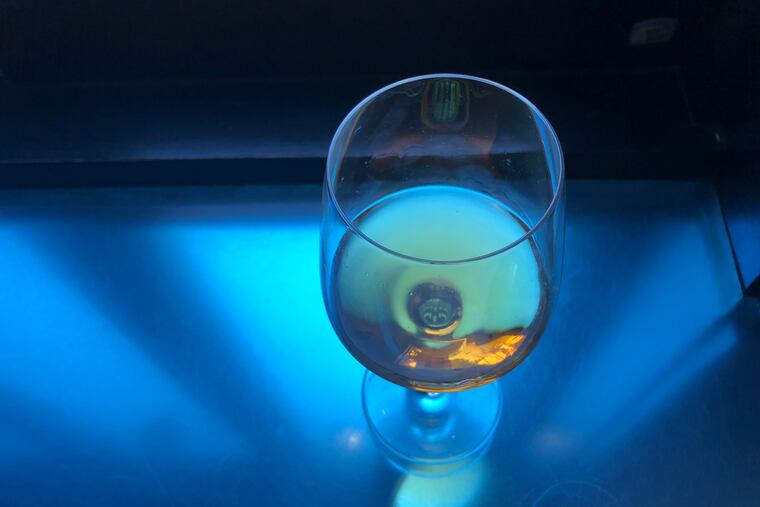 A glass of orange pinot gris at Jet Wine Bar.