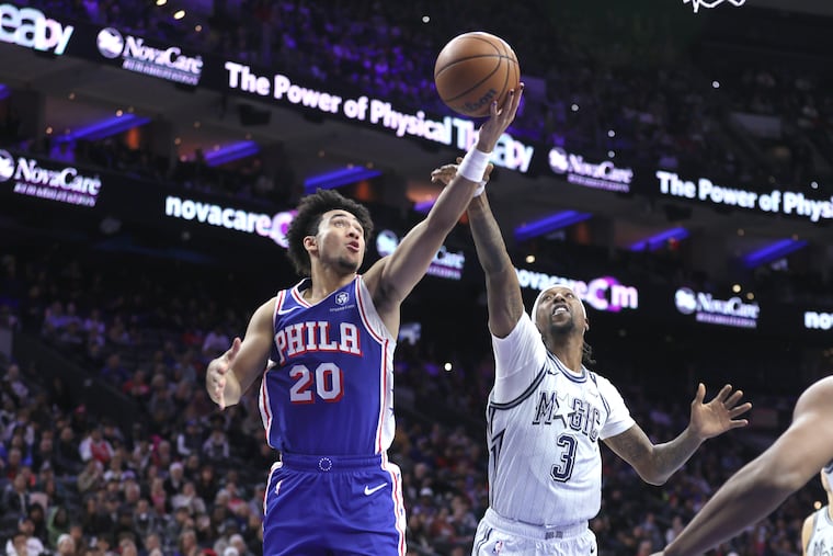 Sixers rookie Jared McCain (left) paced his team with 24 points.