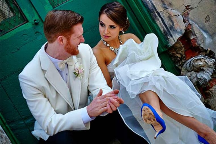 Julia Vdovichenko and Kevin Sanders. (Master Studio Photography)