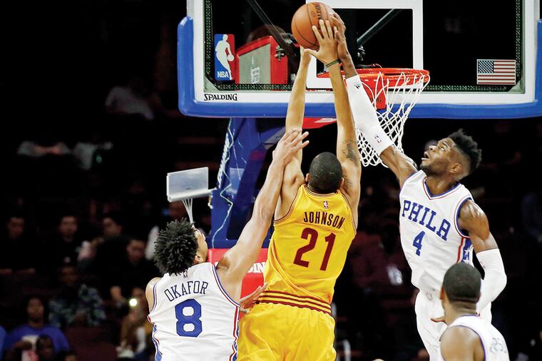 The Sixers are rebuilding slowly on court, with players such as Jahlil Okafor (left) and Nerlens Noel. Things may improve faster on the business side, with local revenue on the rise and coming changes in broadcast income.